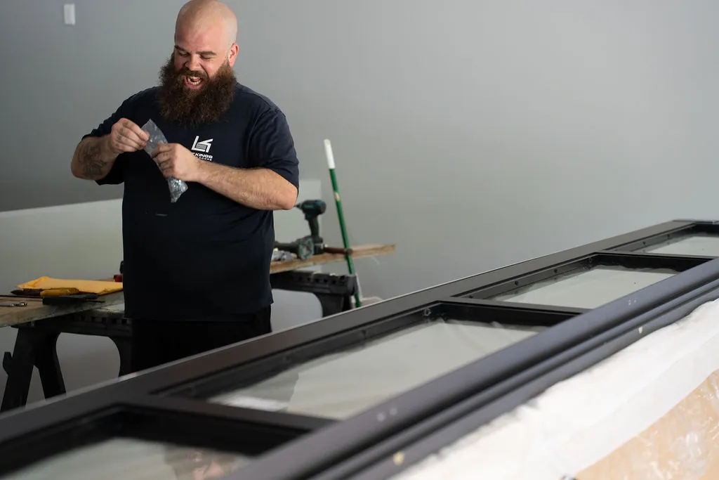 Lift Kings installer prepping hardware for a coastal Palm Beach County install