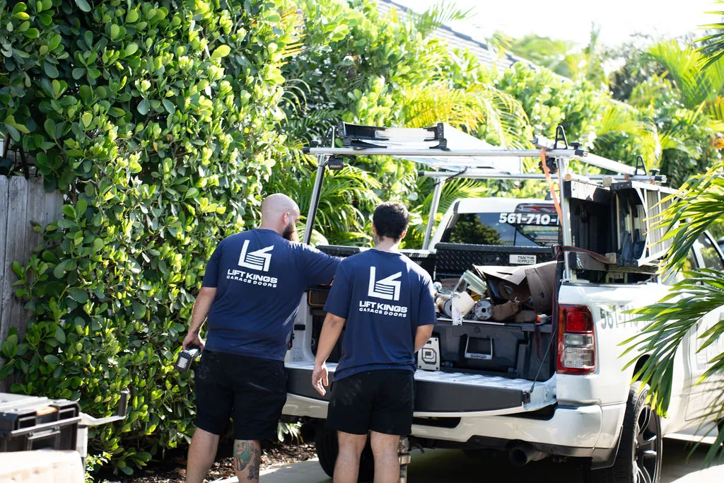 Lift Kings team unloading a service truck at the Lantana shop